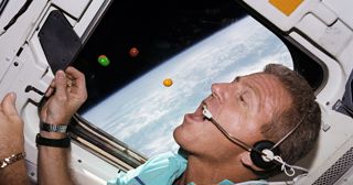 Astronaut Loren Shriver Eating M And Ms Credit NASA Header 1900X0 C Default
