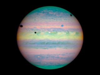 Jupiter with shadows from its moons